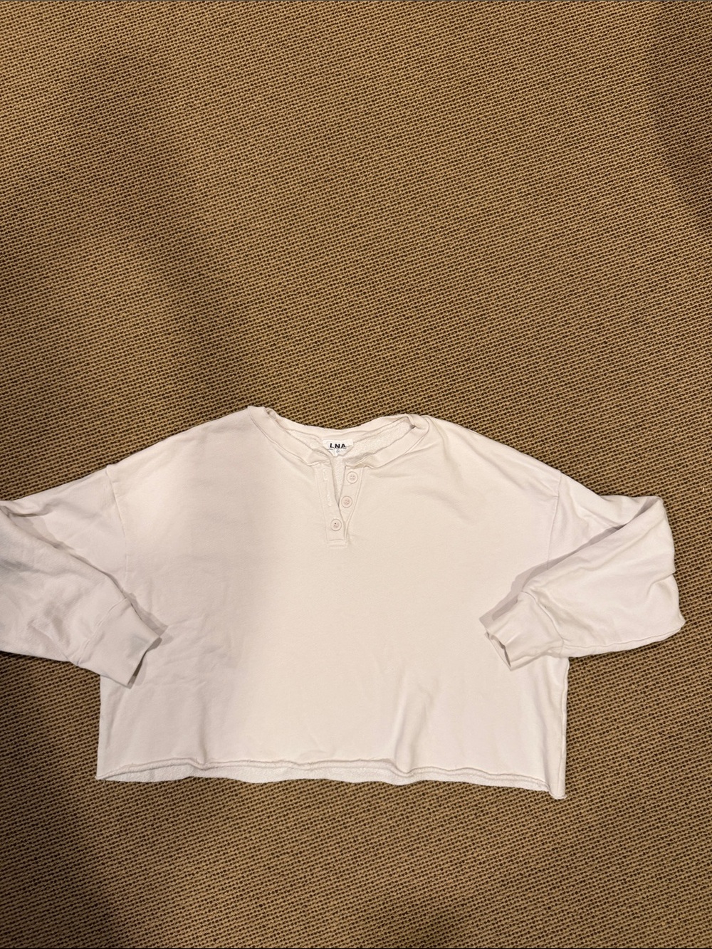 LNA- Cropped cream Henley Top with raw hem and neckline -